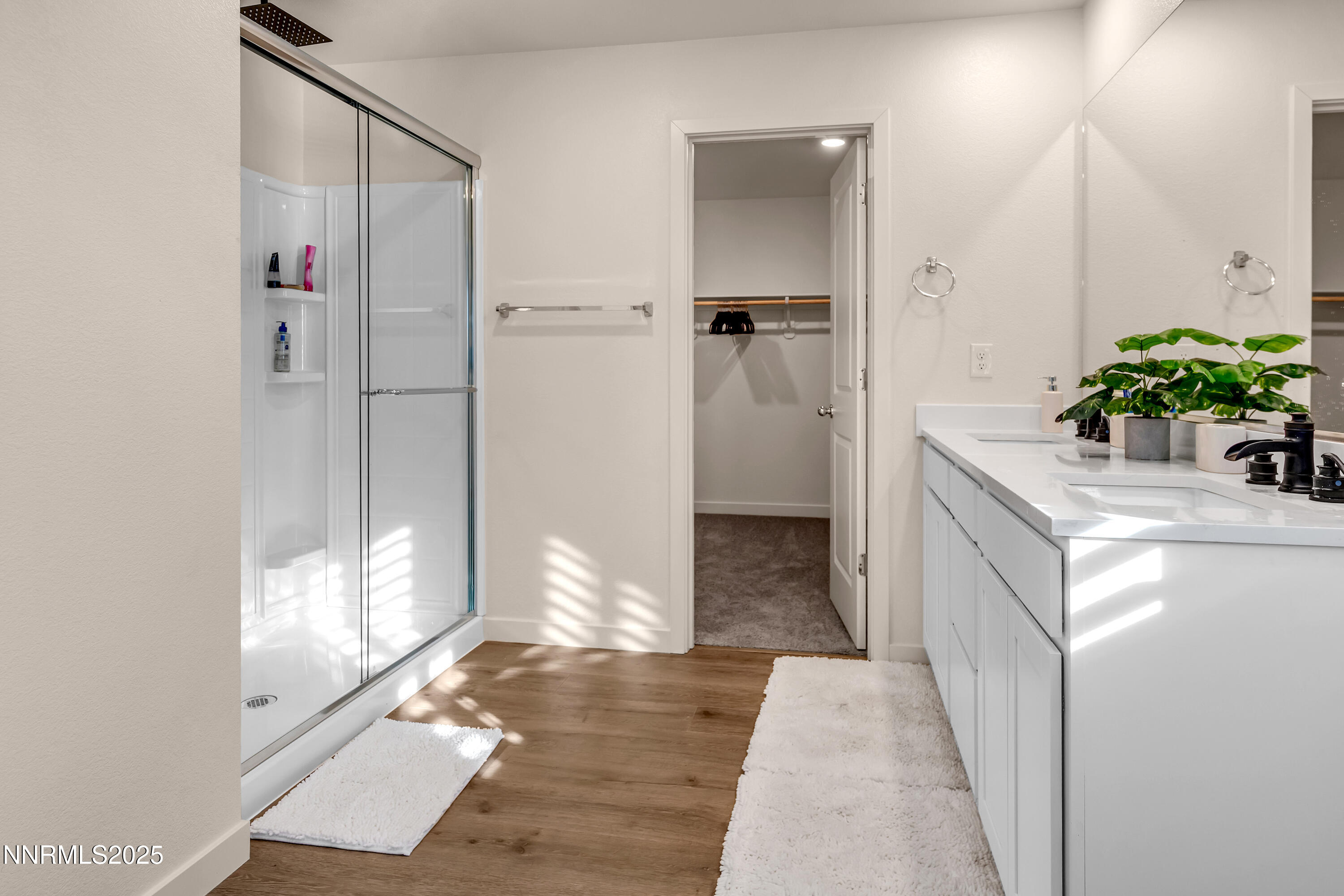 7754 Wandering Way Reno, NV 89506 - Photo 25 of 37 a bathroom with a sink and a mirror