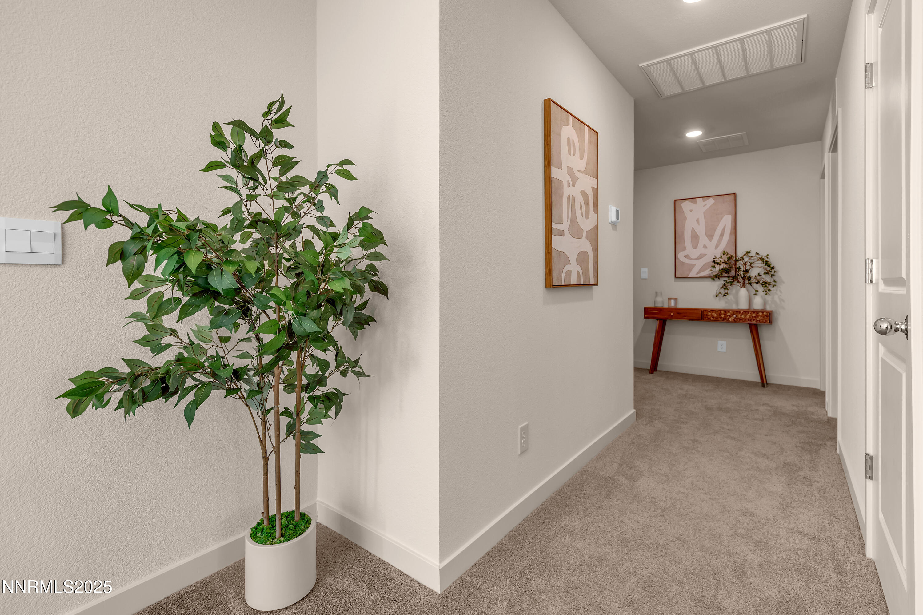 7754 Wandering Way Reno, NV 89506 - Photo 33 of 37 a vase of flowers sitting on a table