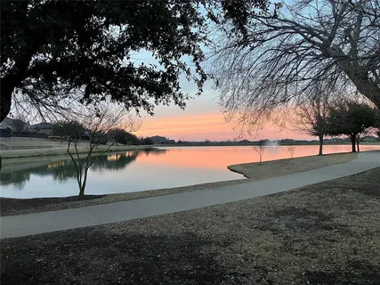 a view of a lake with a houses