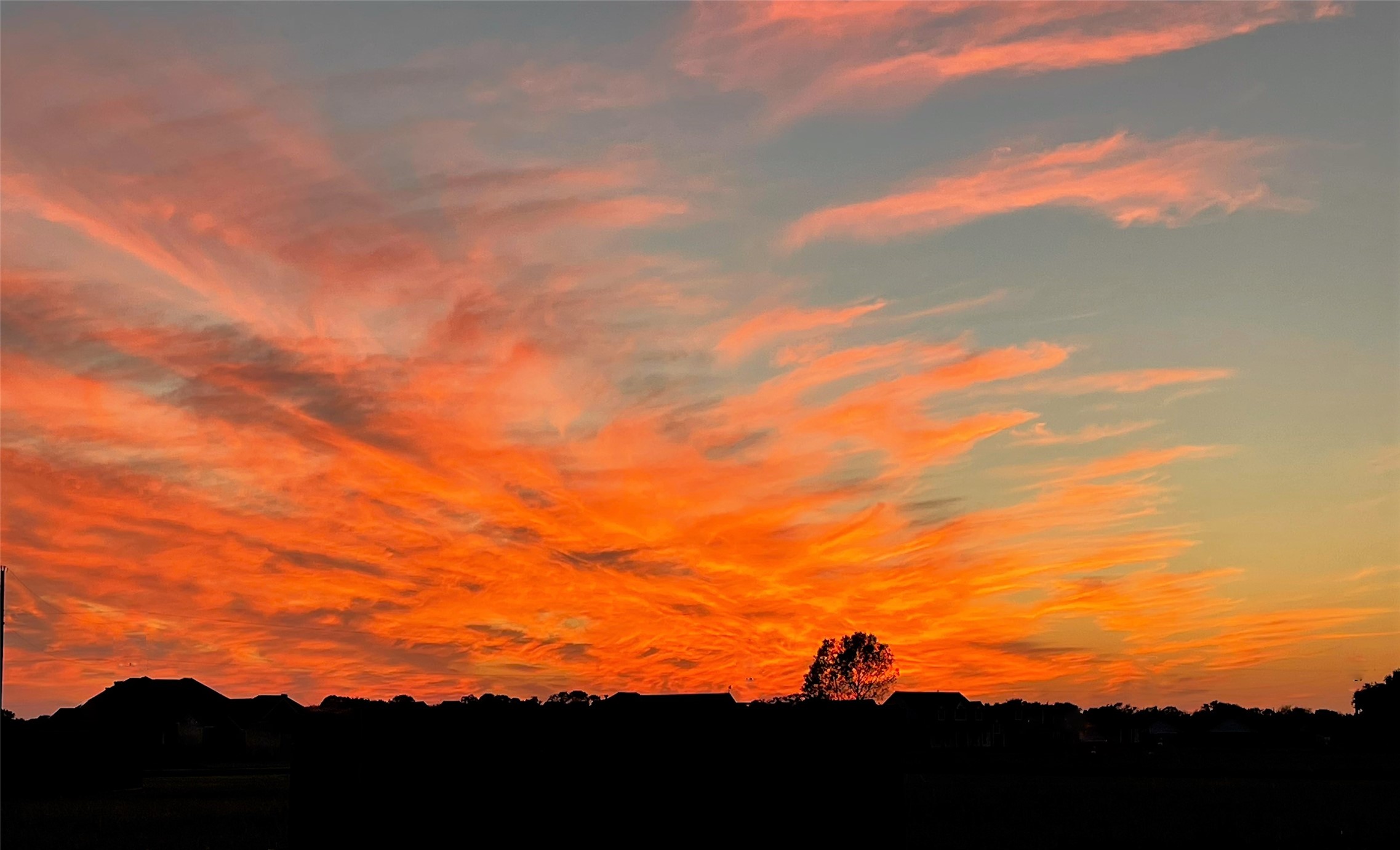 722 Bunkhouse Trail Angleton, TX 77515 - Photo 28 of 28 A view of the beautiful sunset from the back patio