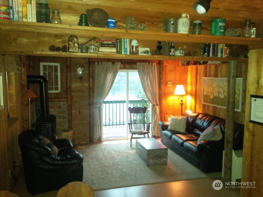 4825 Lerch Road Snohomish, WA 98290 - Photo 13 of 32 a living room with furniture and a floor to ceiling window