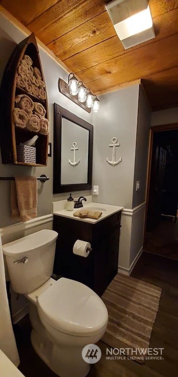 4825 Lerch Road Snohomish, WA 98290 - Photo 24 of 32 a bathroom with a toilet sink and mirror