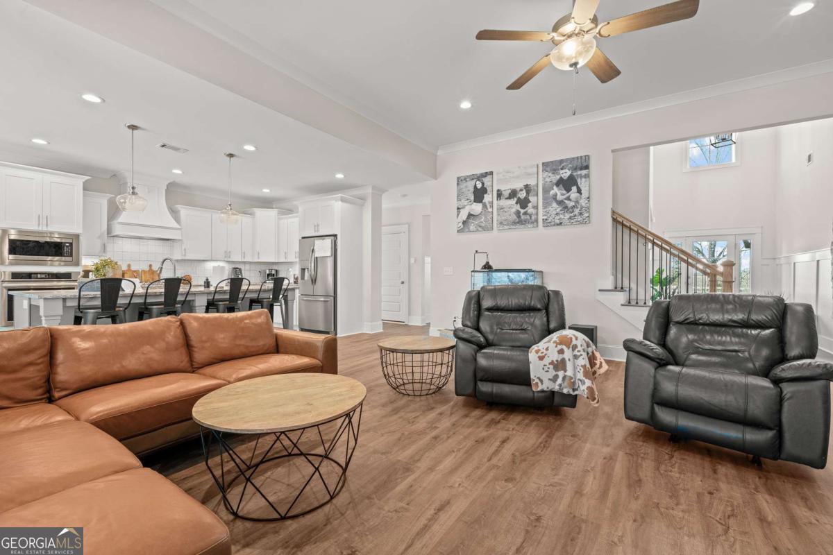 1515 Pleasant Ridge Road Carrollton, GA 30117 - Photo 17 of 72 a living room with furniture and a view of kitchen