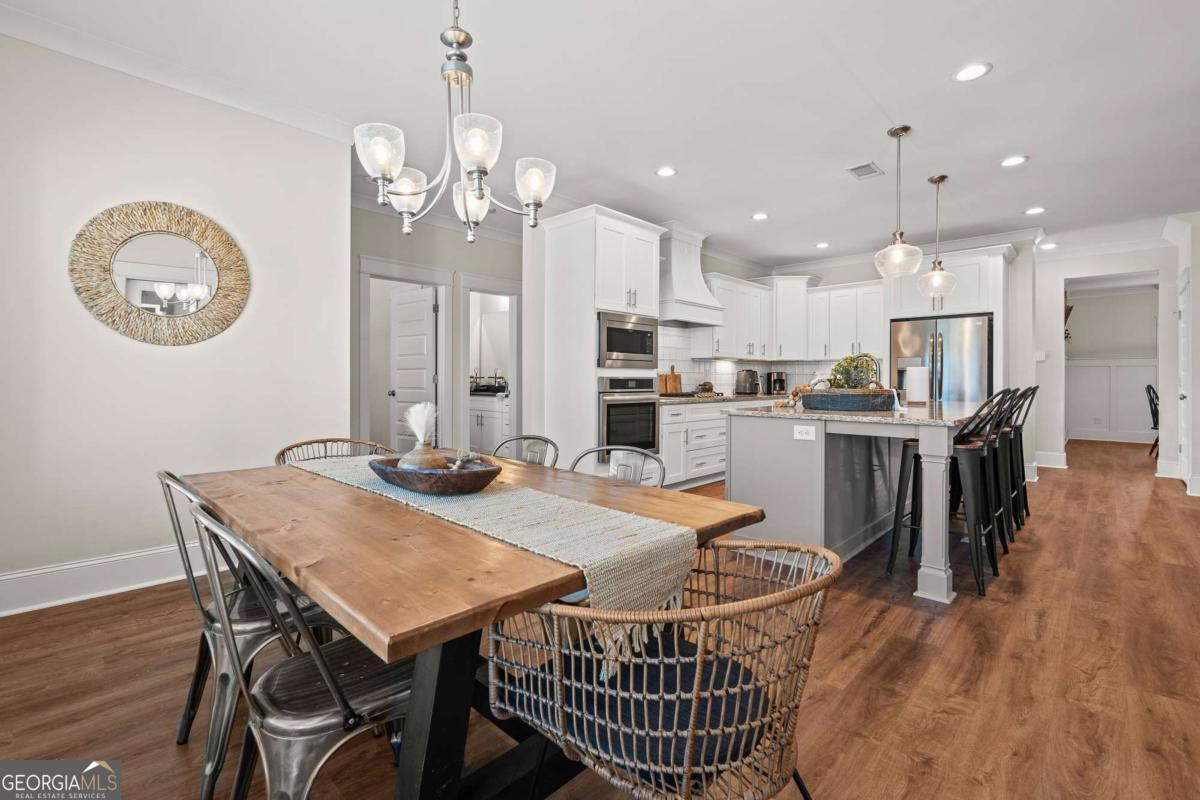 1515 Pleasant Ridge Road Carrollton, GA 30117 - Photo 24 of 72 a view of a dining room with furniture