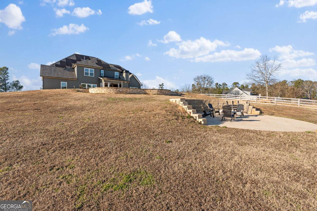 1515 Pleasant Ridge Road Carrollton, GA 30117 - Photo 58 of 72 a view of a lake in front of house
