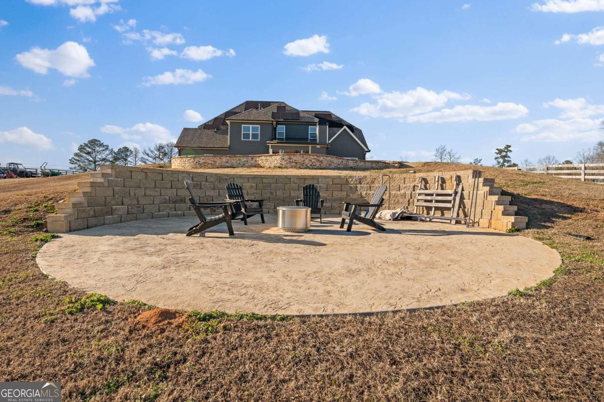 1515 Pleasant Ridge Road Carrollton, GA 30117 - Photo 60 of 72 a view of a house with a yard