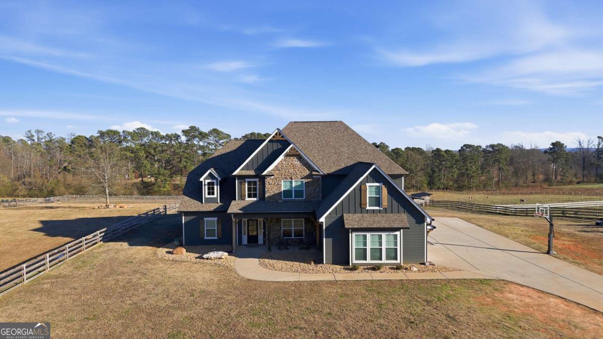 1515 Pleasant Ridge Road Carrollton, GA 30117 - Photo 68 of 72 front view of a house with a yard