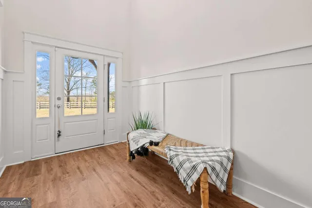 a view of entryway with wooden floor