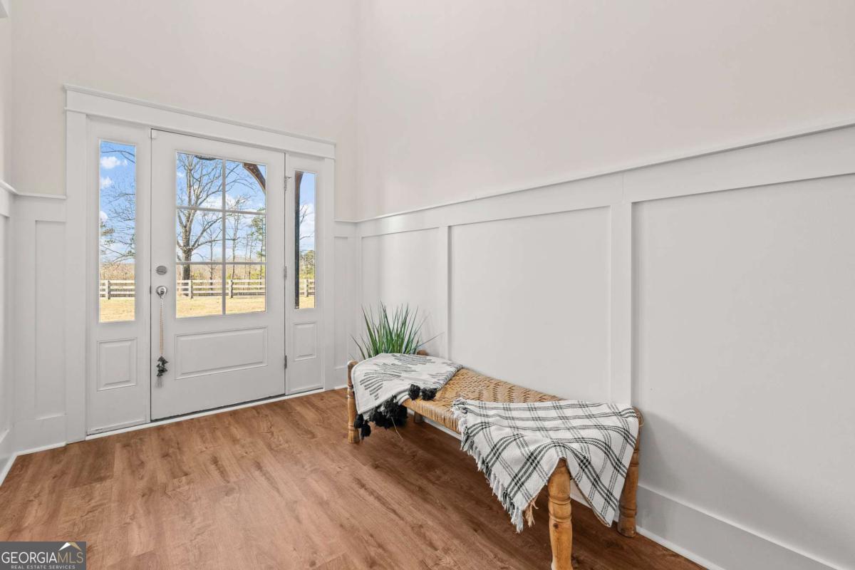 1515 Pleasant Ridge Road Carrollton, GA 30117 - Photo 9 of 72 a living room with furniture and a window