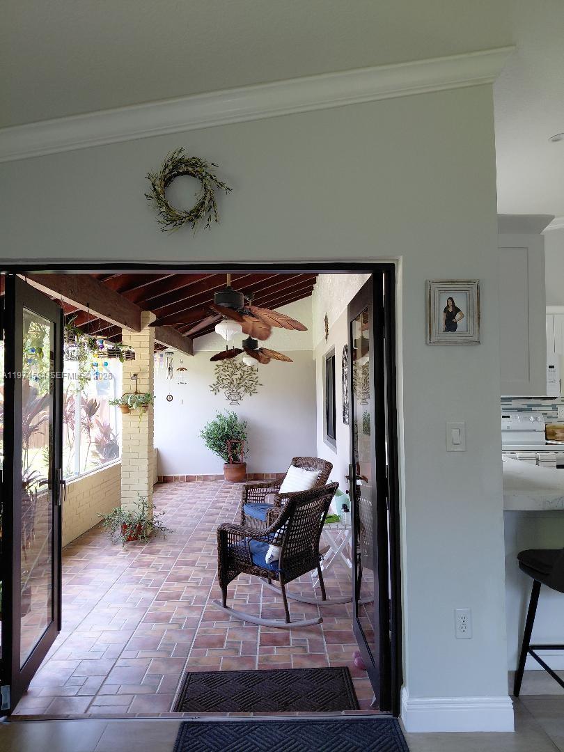15630 Southwest 146th Avenue Miami, FL 33177 - Photo 7 of 23 a view of an outdoor space with seating area