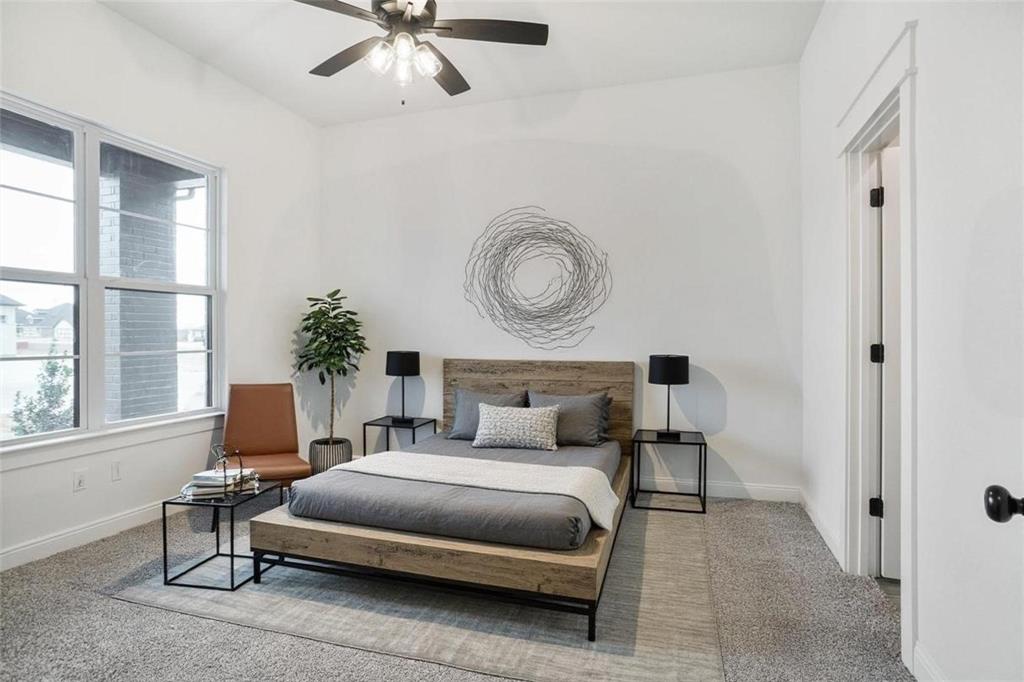 117 Sammy Street Godley, TX 76044 - Photo 14 of 27 a bedroom with a bed and window