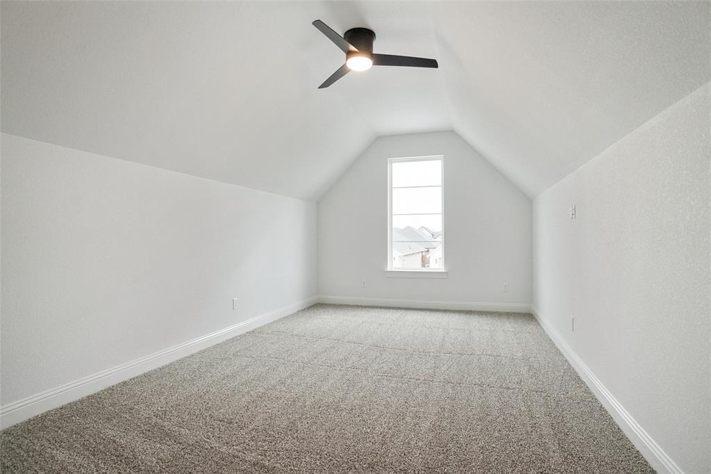 117 Sammy Street Godley, TX 76044 - Photo 19 of 27 an empty room with a window and a fan