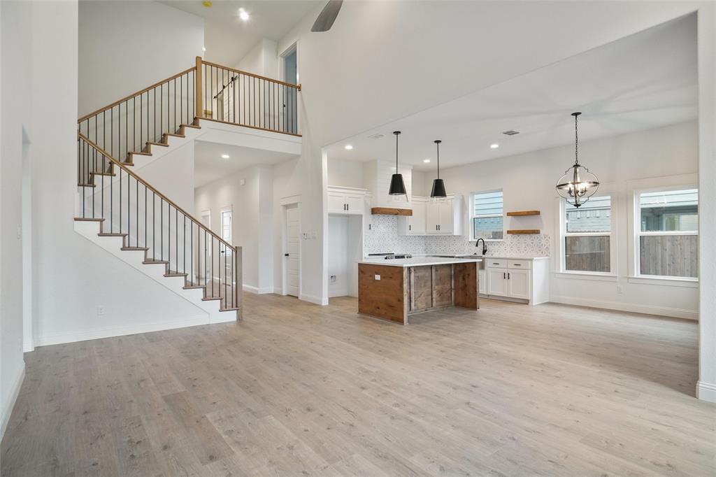 117 Sammy Street Godley, TX 76044 - Photo 27 of 27 a view of kitchen with cabinets and window