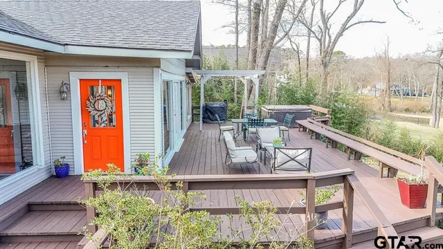 a view of balcony with furniture
