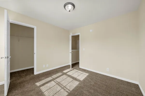 a bathroom with a sink a toilet a shower and a mirror