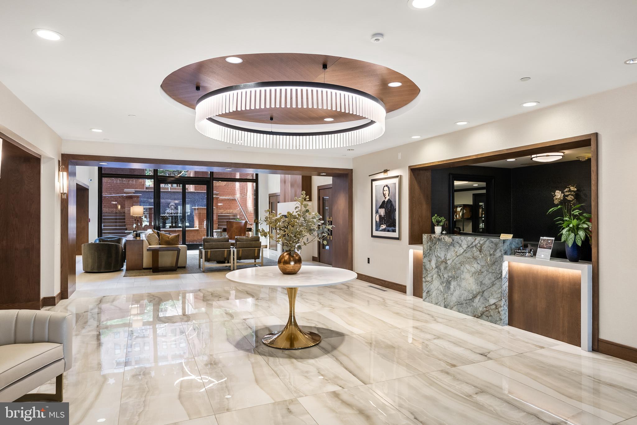 616 E Street Northwest, Unit 1019 Washington, DC 20004 - Photo 18 of 21 a living room with furniture