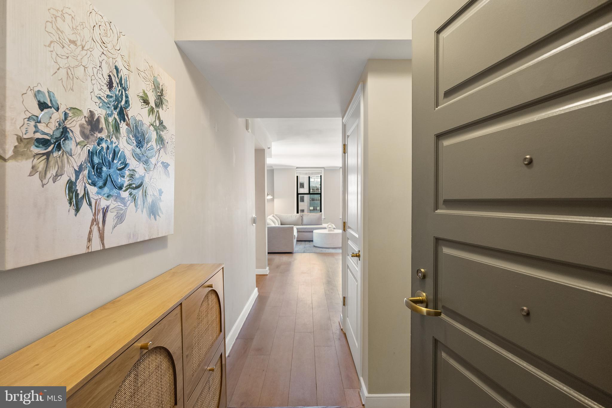 616 E Street Northwest, Unit 1019 Washington, DC 20004 - Photo 9 of 21 a view of a hallway with wooden floor