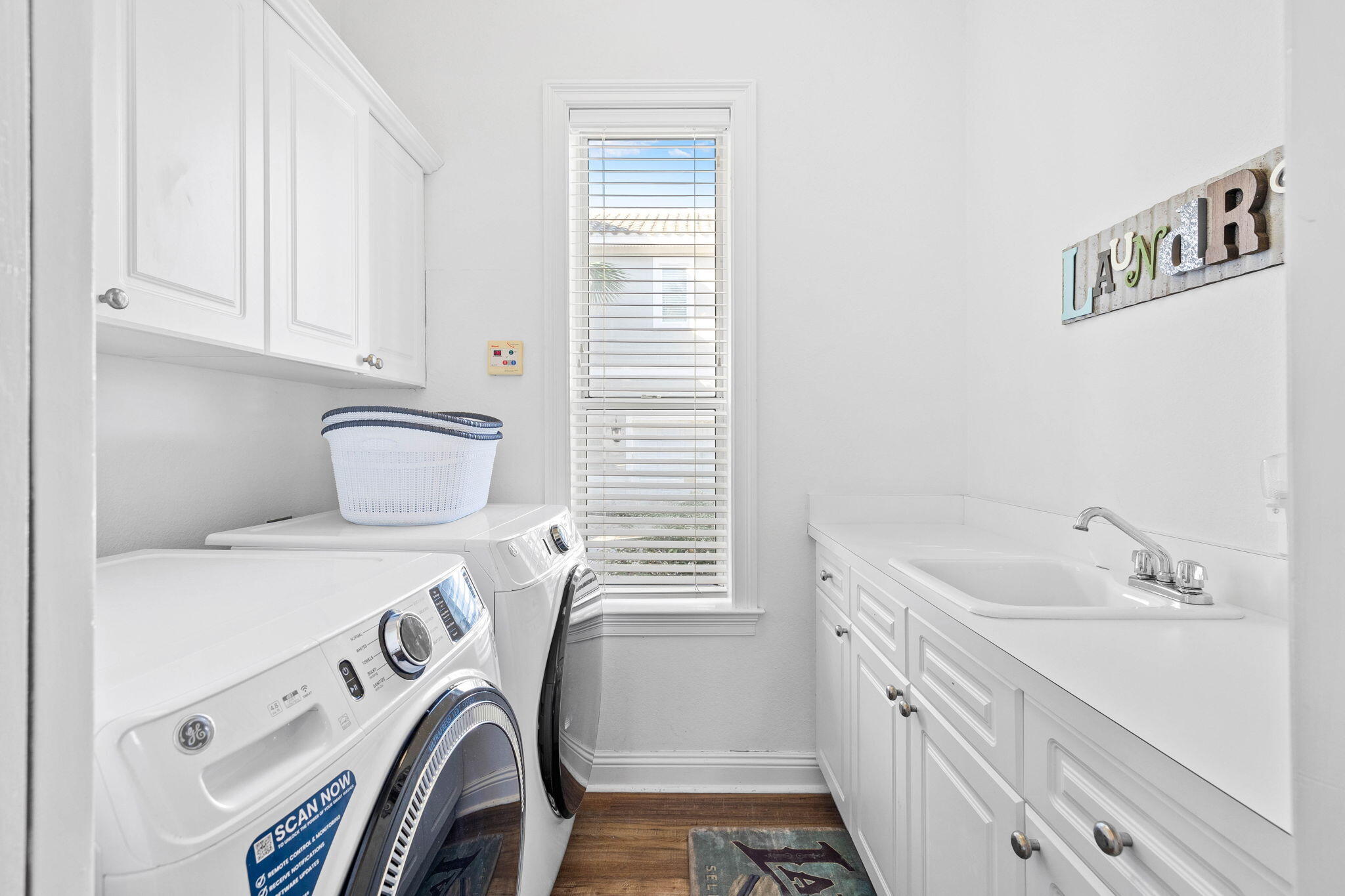 48 Tranquility Lane Destin, FL 32541 - Photo 18 of 45 a bathroom with a sink and a mirror