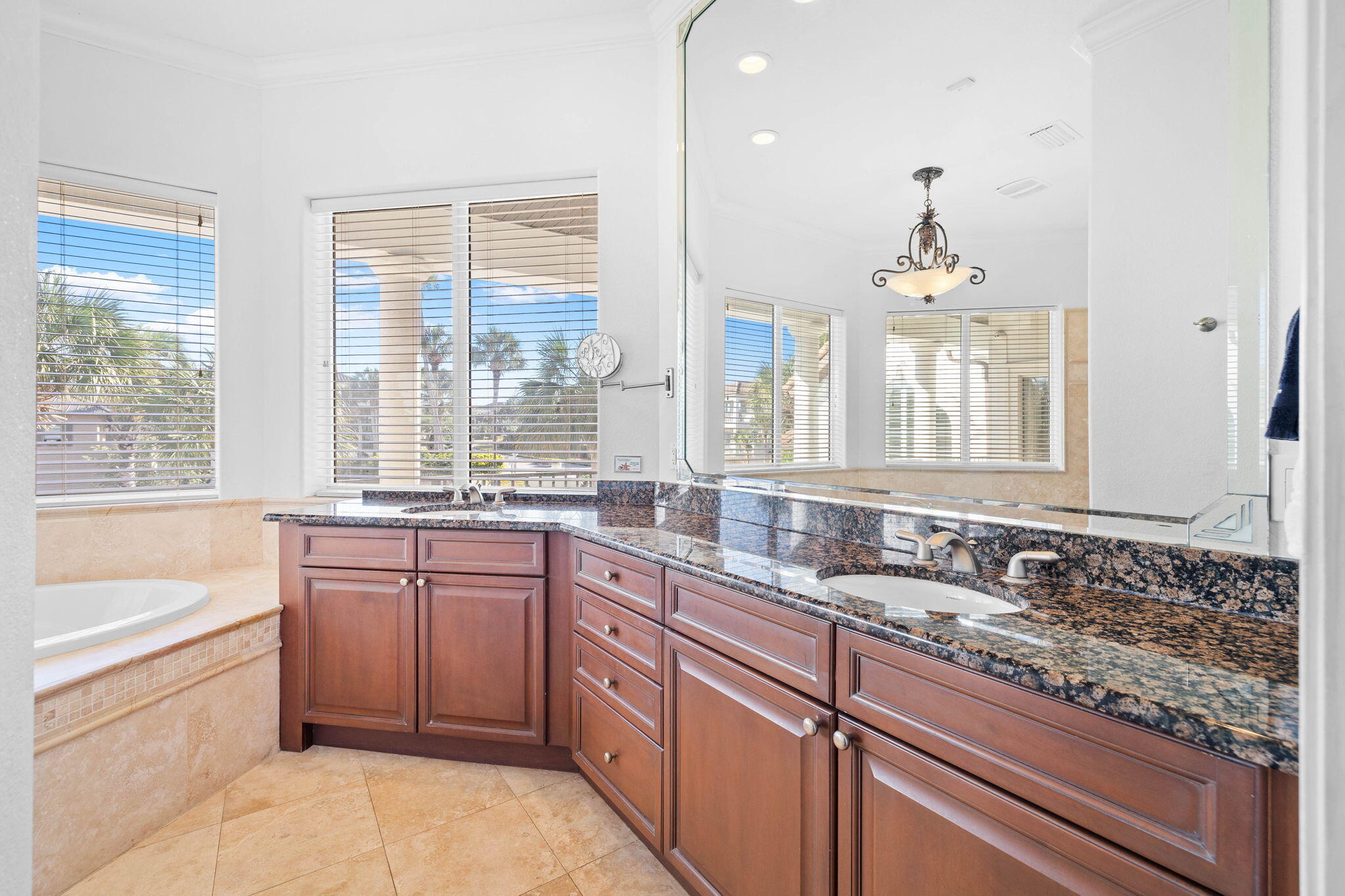 48 Tranquility Lane Destin, FL 32541 - Photo 22 of 45 a bathroom with a granite countertop sink and a large mirror