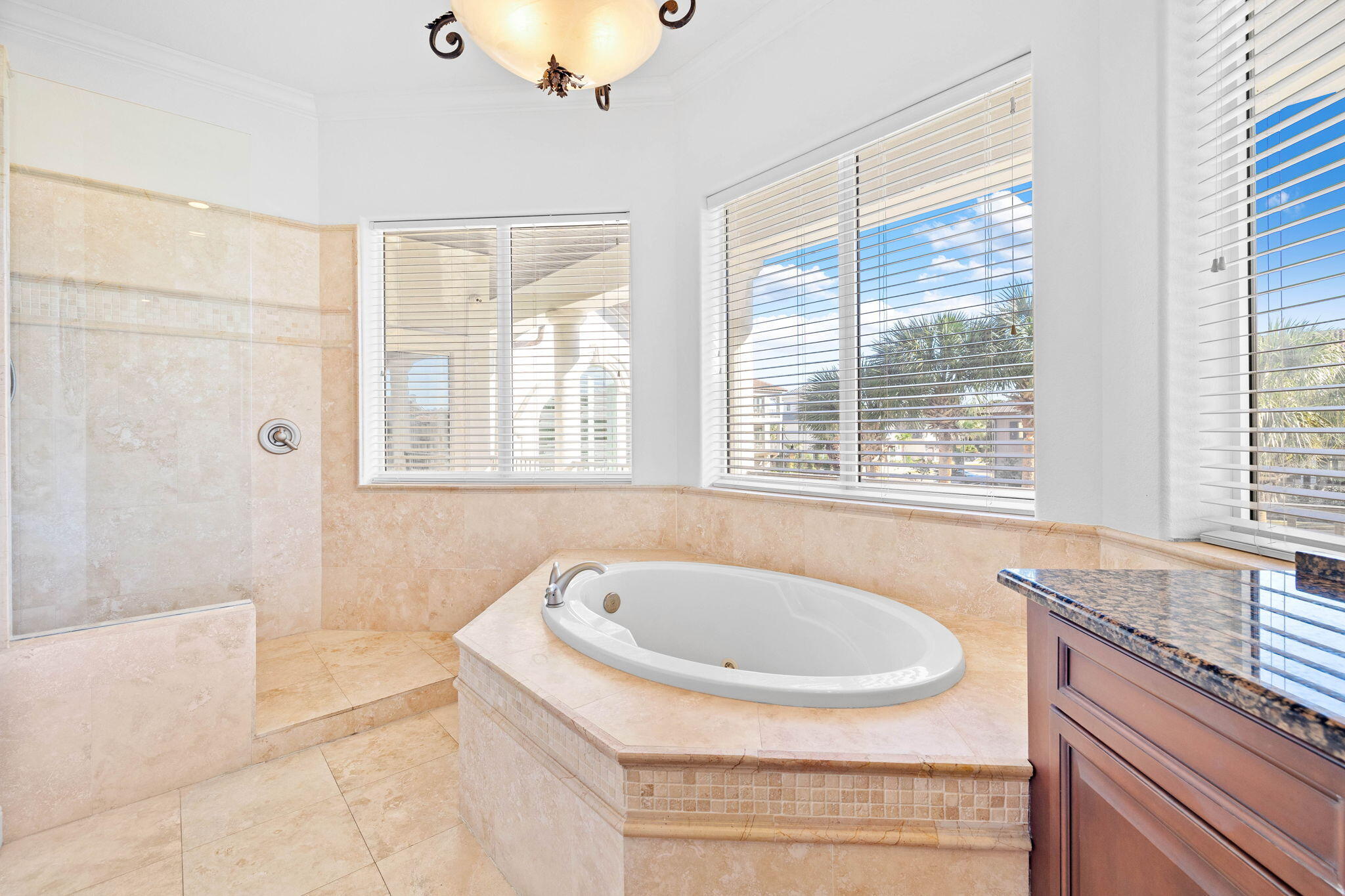 48 Tranquility Lane Destin, FL 32541 - Photo 23 of 45 a bathroom with a granite countertop tub and a sink