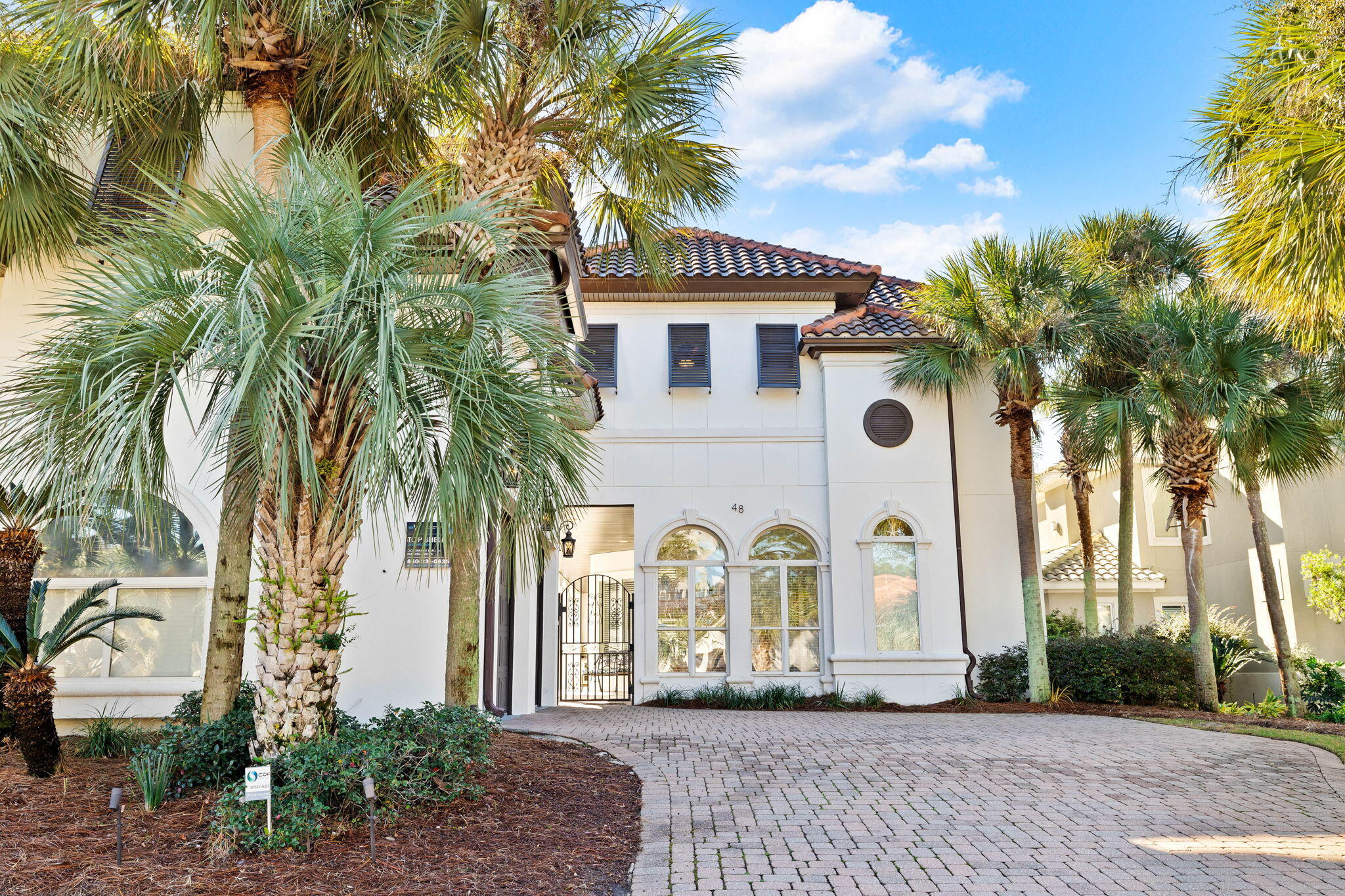 48 Tranquility Lane Destin, FL 32541 - Photo 43 of 45 a front view of a house with garden