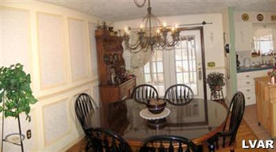 2327 Mountain Road Slatington, PA 18080 - Photo 3 of 9 a view of a dining room with furniture window and outside view