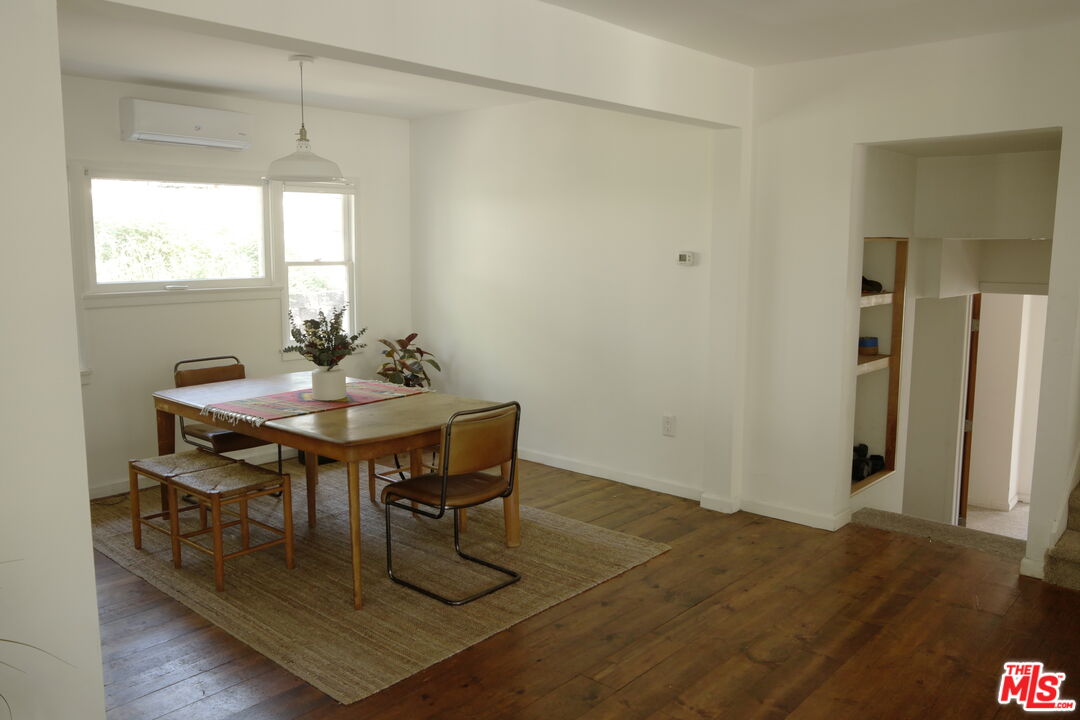 53505 Tollgate Road Idyllwild, CA 92549 - Photo 12 of 42 a view of a dining room with furniture and window