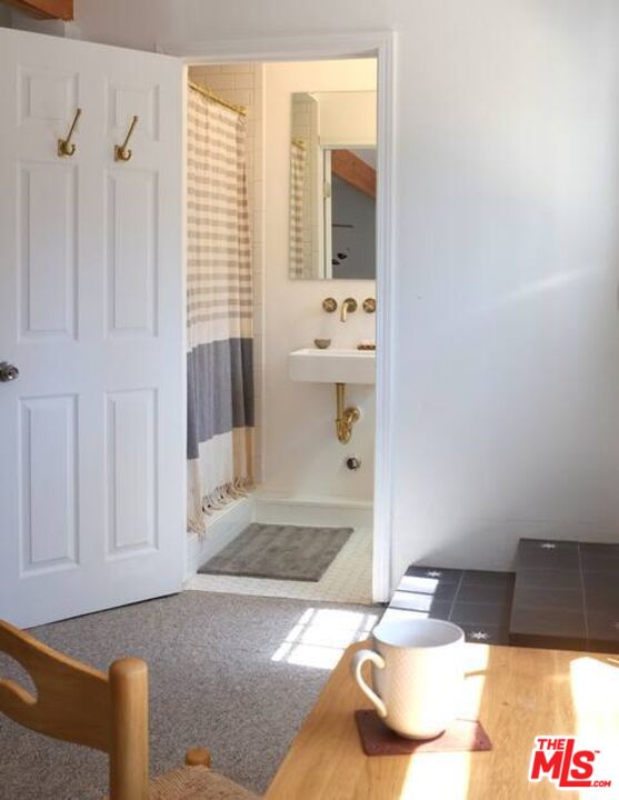 53505 Tollgate Road Idyllwild, CA 92549 - Photo 31 of 42 a bathroom with a tub and shower