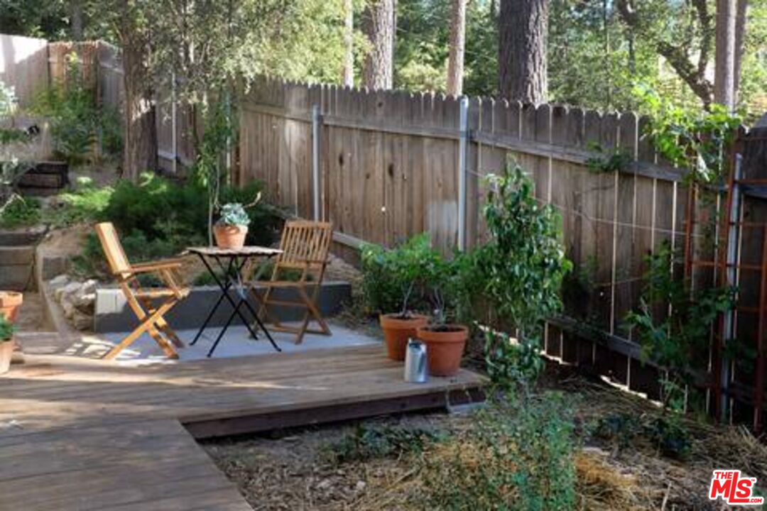 53505 Tollgate Road Idyllwild, CA 92549 - Photo 35 of 42 a view of a backyard with sitting area and furniture
