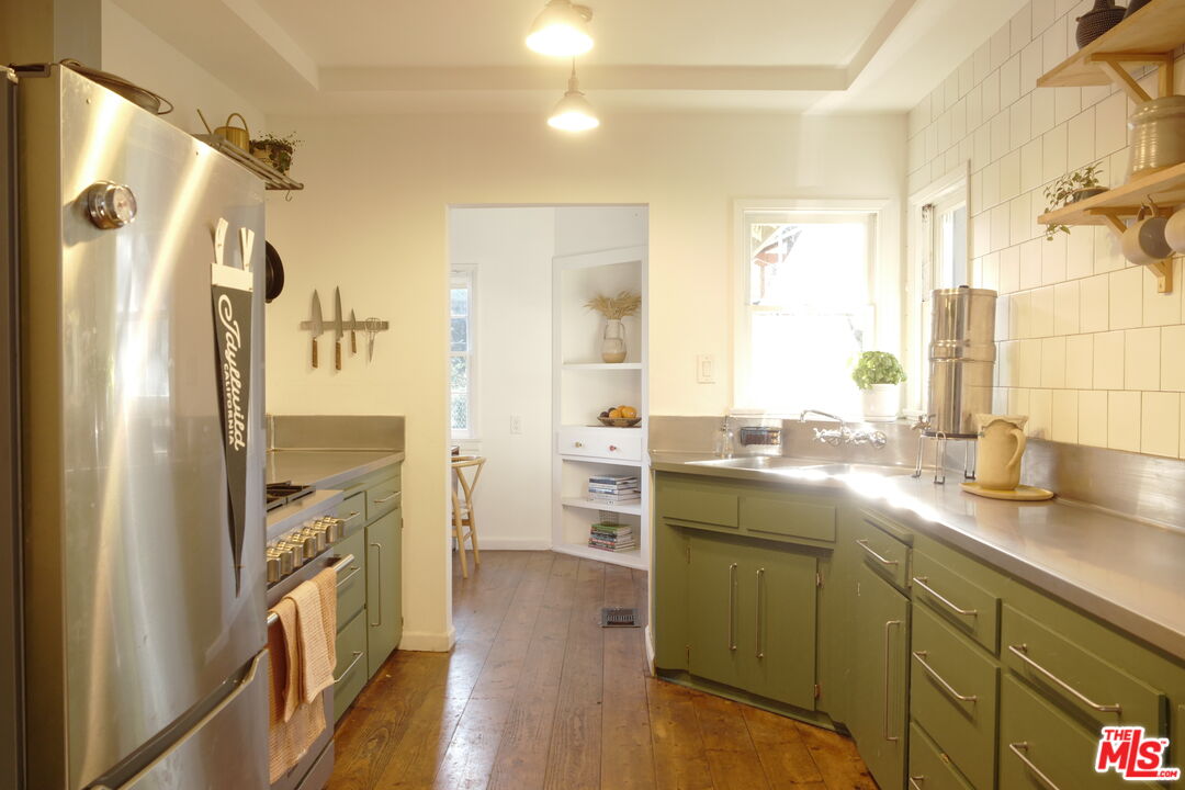 53505 Tollgate Road Idyllwild, CA 92549 - Photo 10 of 42 a kitchen with a refrigerator and a sink