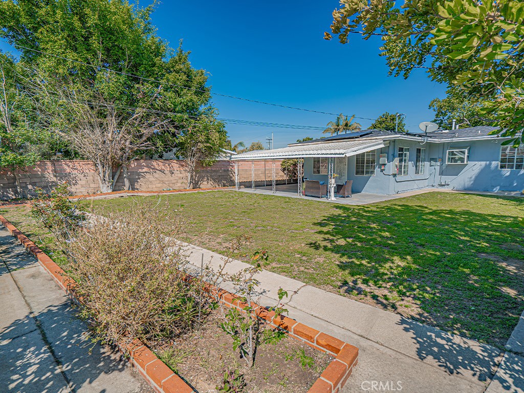 150 East 233rd Street Carson, CA 90745 - Photo 20 of 22 a view of a house with a yard