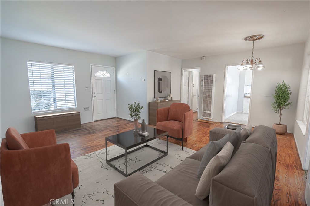 150 East 233rd Street Carson, CA 90745 - Photo 3 of 22 a living room with furniture and a window