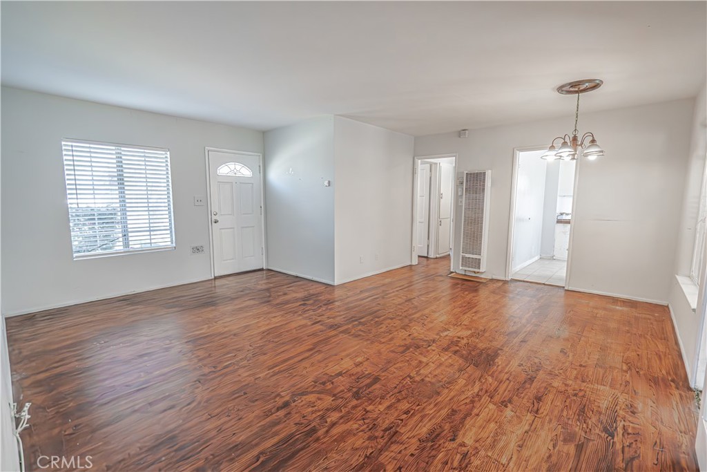 150 East 233rd Street Carson, CA 90745 - Photo 4 of 22 a view of empty room with wooden floor