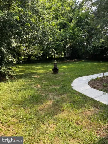 a view of a field with grass