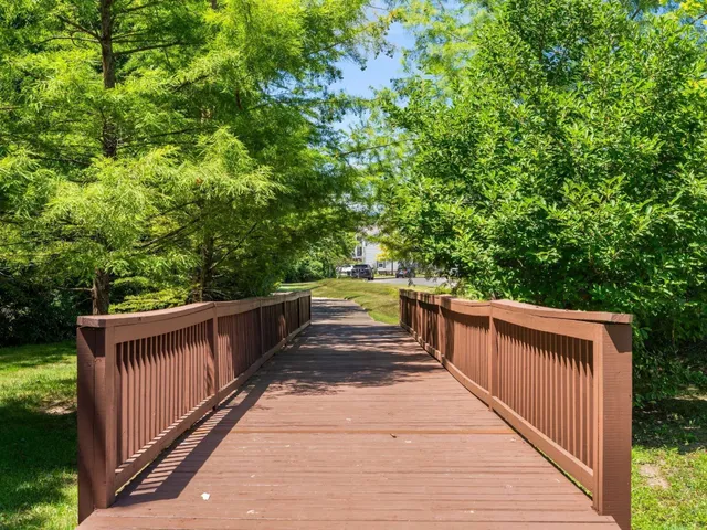 a balcony with wooden floor