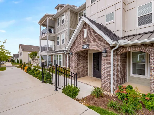 a front view of a house with a porch