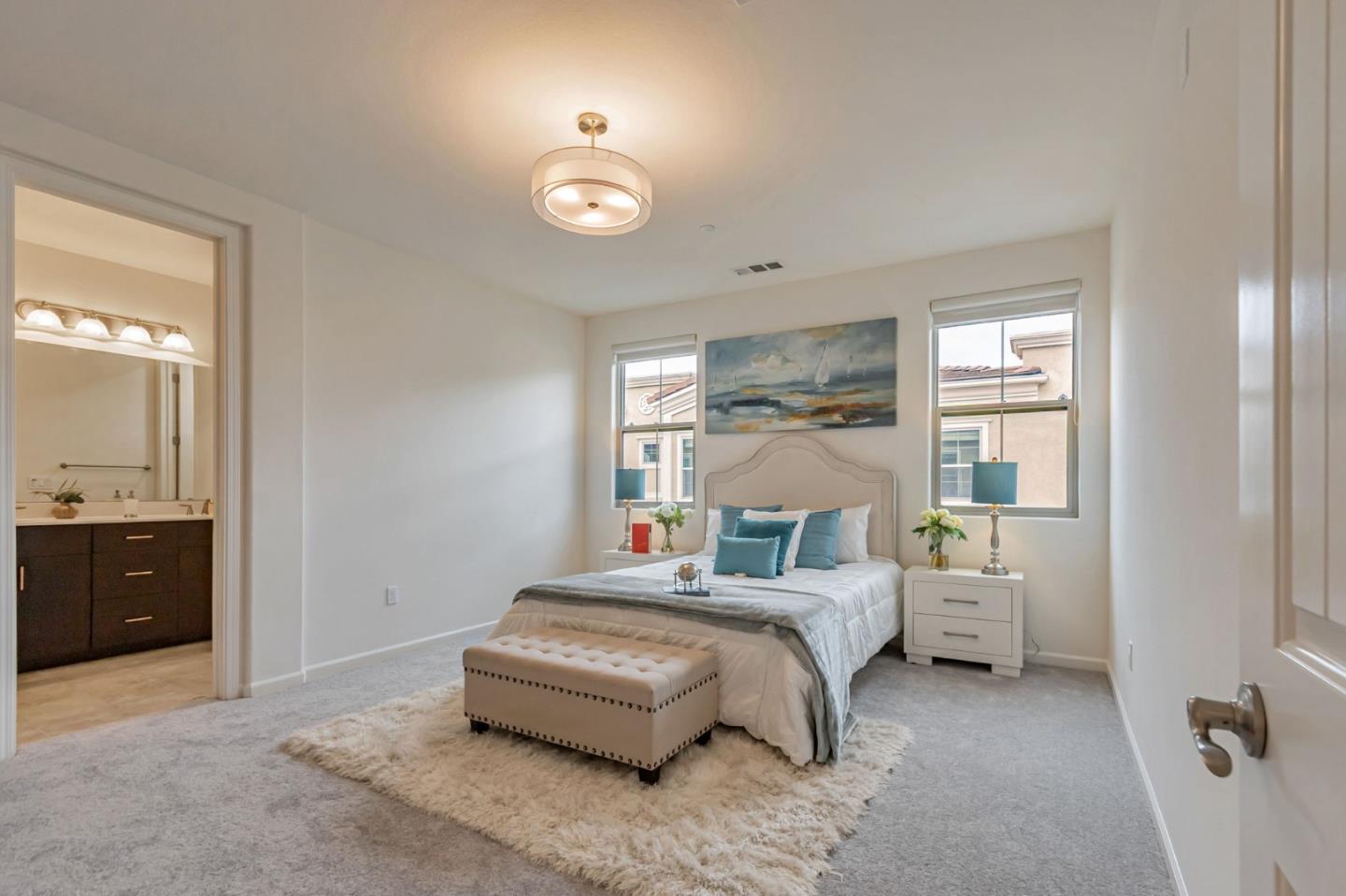 1890 Trento Loop Milpitas, CA 95035 - Photo 17 of 39 a bedroom with a bed and a couch