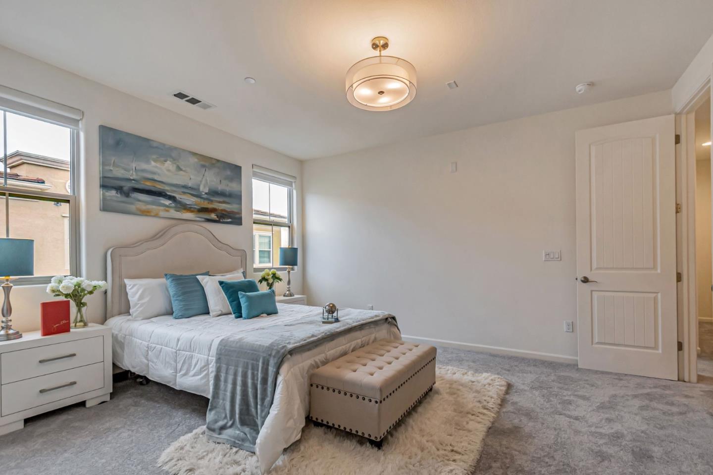 1890 Trento Loop Milpitas, CA 95035 - Photo 19 of 39 a bedroom with a bed and window