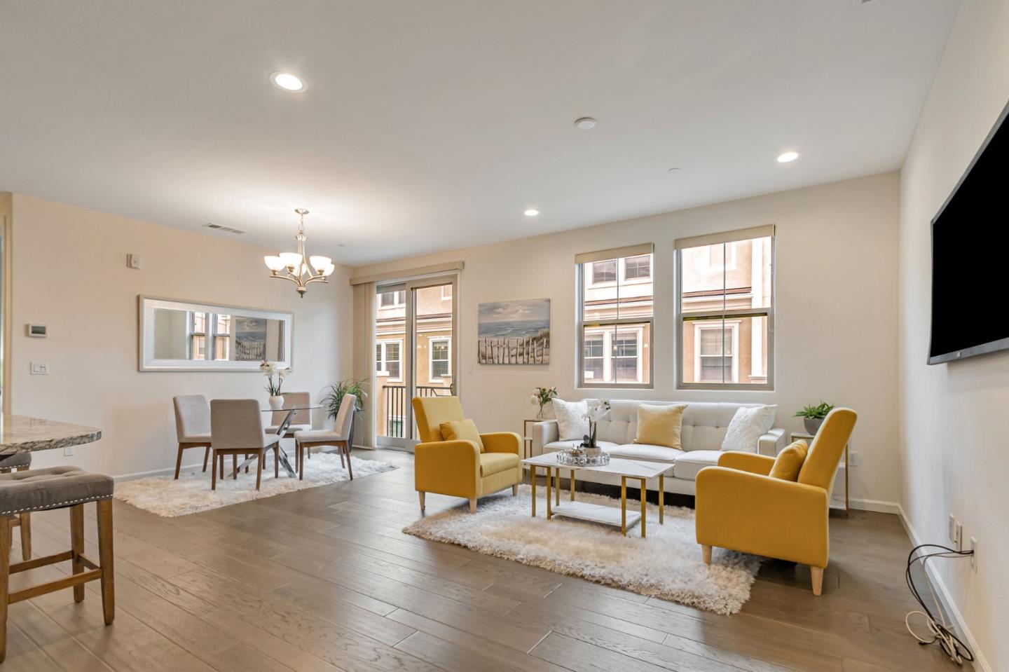 1890 Trento Loop Milpitas, CA 95035 - Photo 2 of 39 a living room with furniture and a flat screen tv
