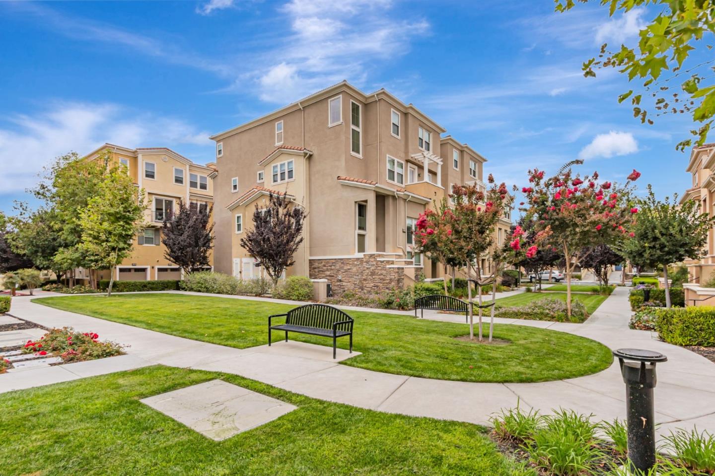 1890 Trento Loop Milpitas, CA 95035 - Photo 25 of 39 a front view of a house with a yard