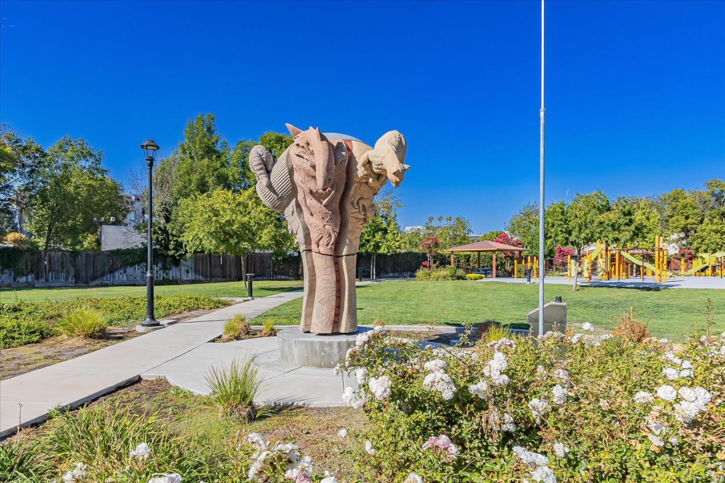 1890 Trento Loop Milpitas, CA 95035 - Photo 30 of 39 a view of a garden with a slide