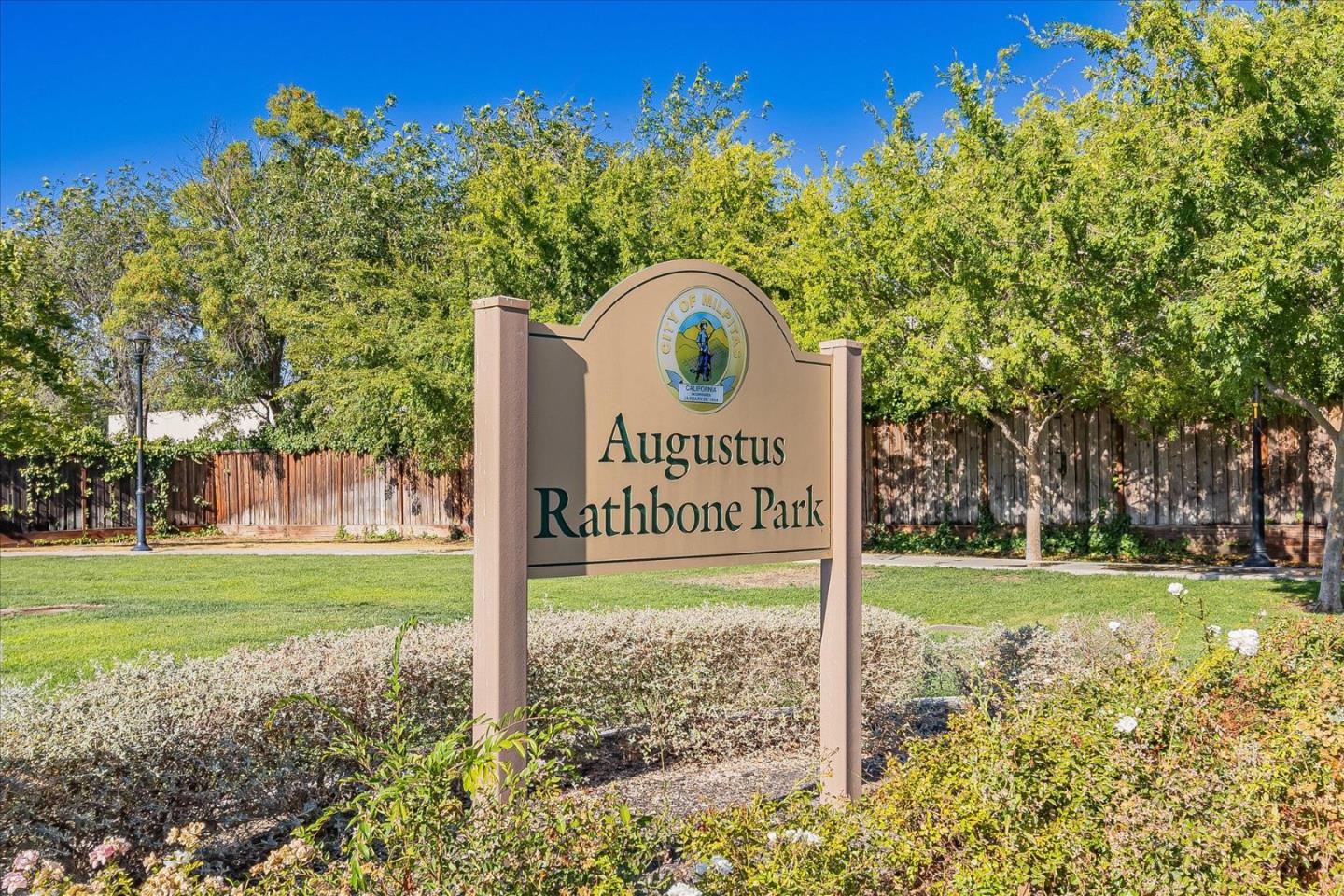 1890 Trento Loop Milpitas, CA 95035 - Photo 32 of 39 a sign on the side of the park