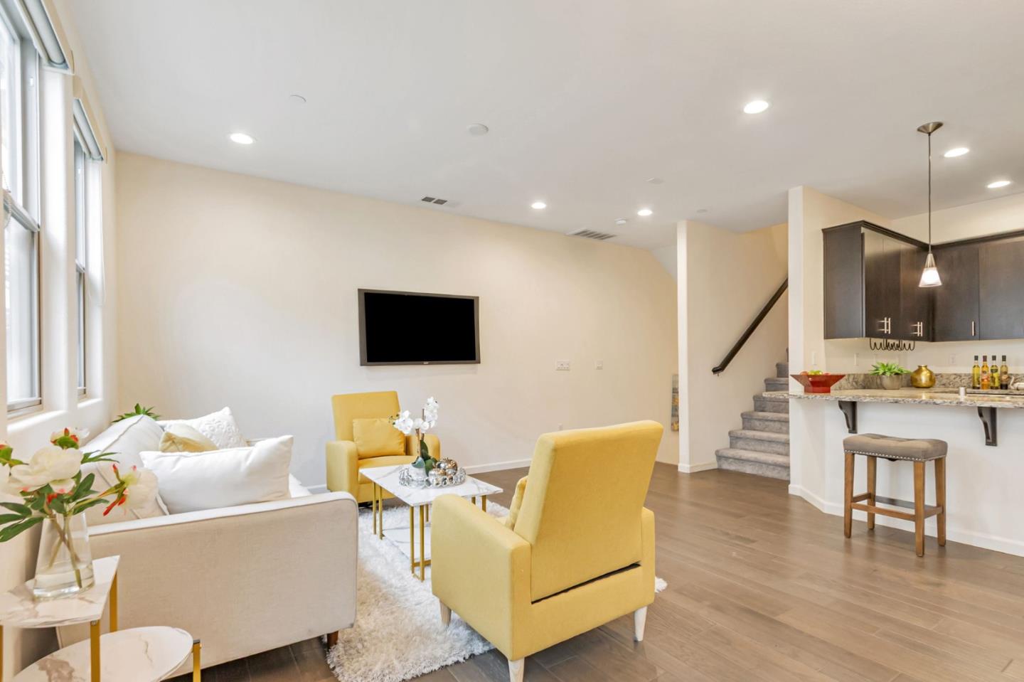 1890 Trento Loop Milpitas, CA 95035 - Photo 4 of 39 a living room with furniture and a flat screen tv