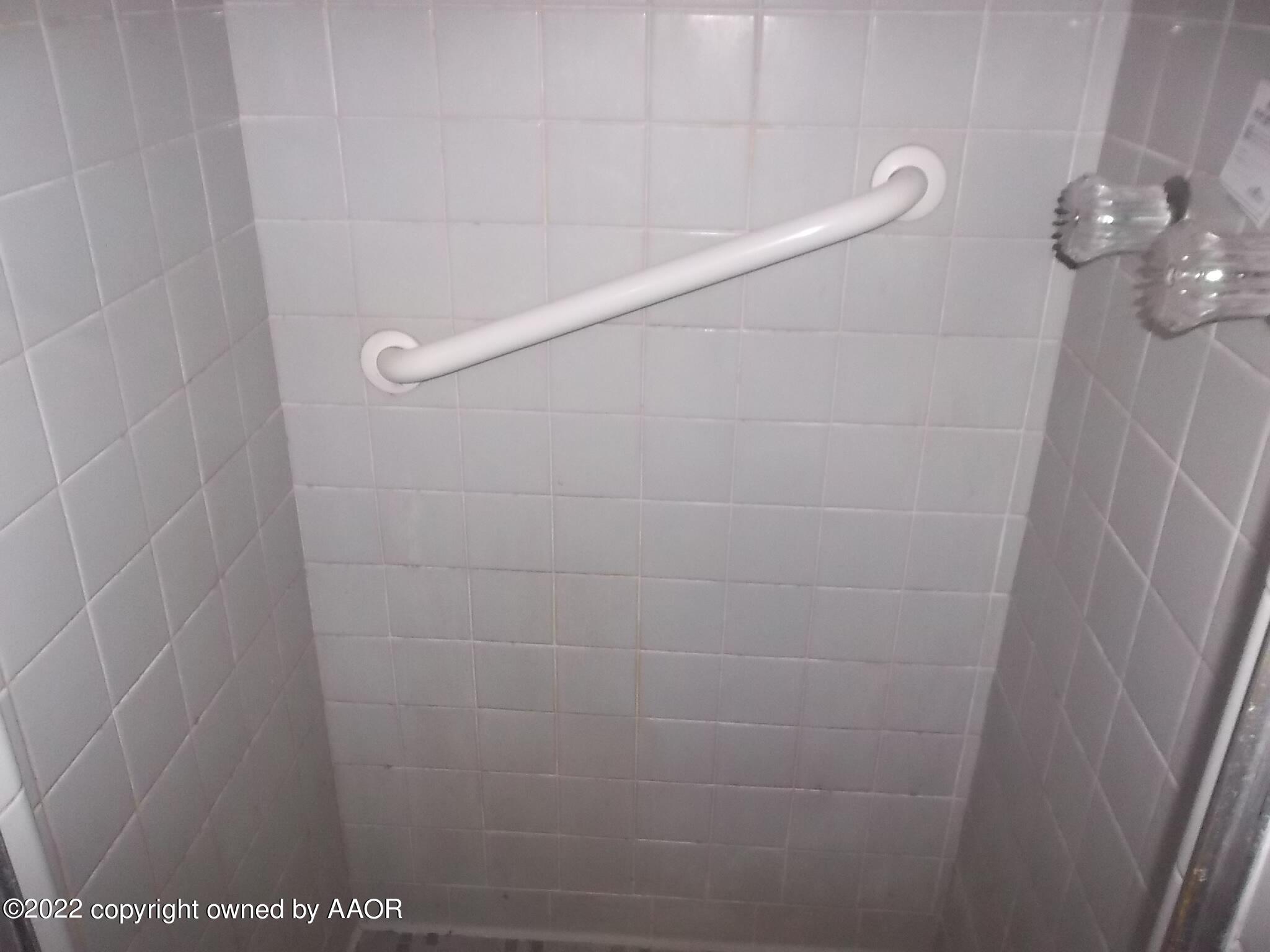 4010 Tucson Drive Amarillo, TX 79109 - Photo 23 of 23 a bathroom with a shower