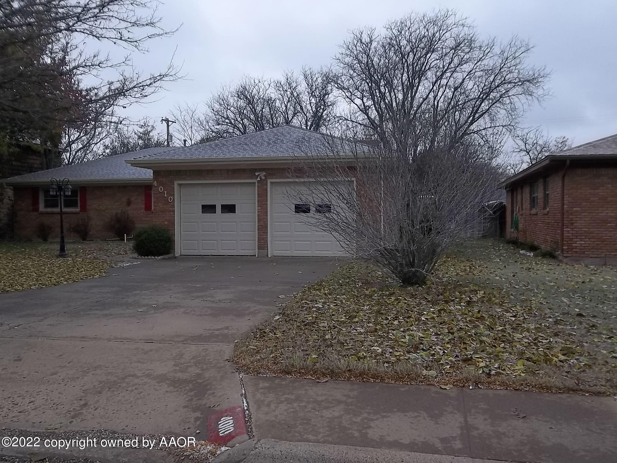 4010 Tucson Drive Amarillo, TX 79109 - Photo 4 of 23 a view of a house with a yard