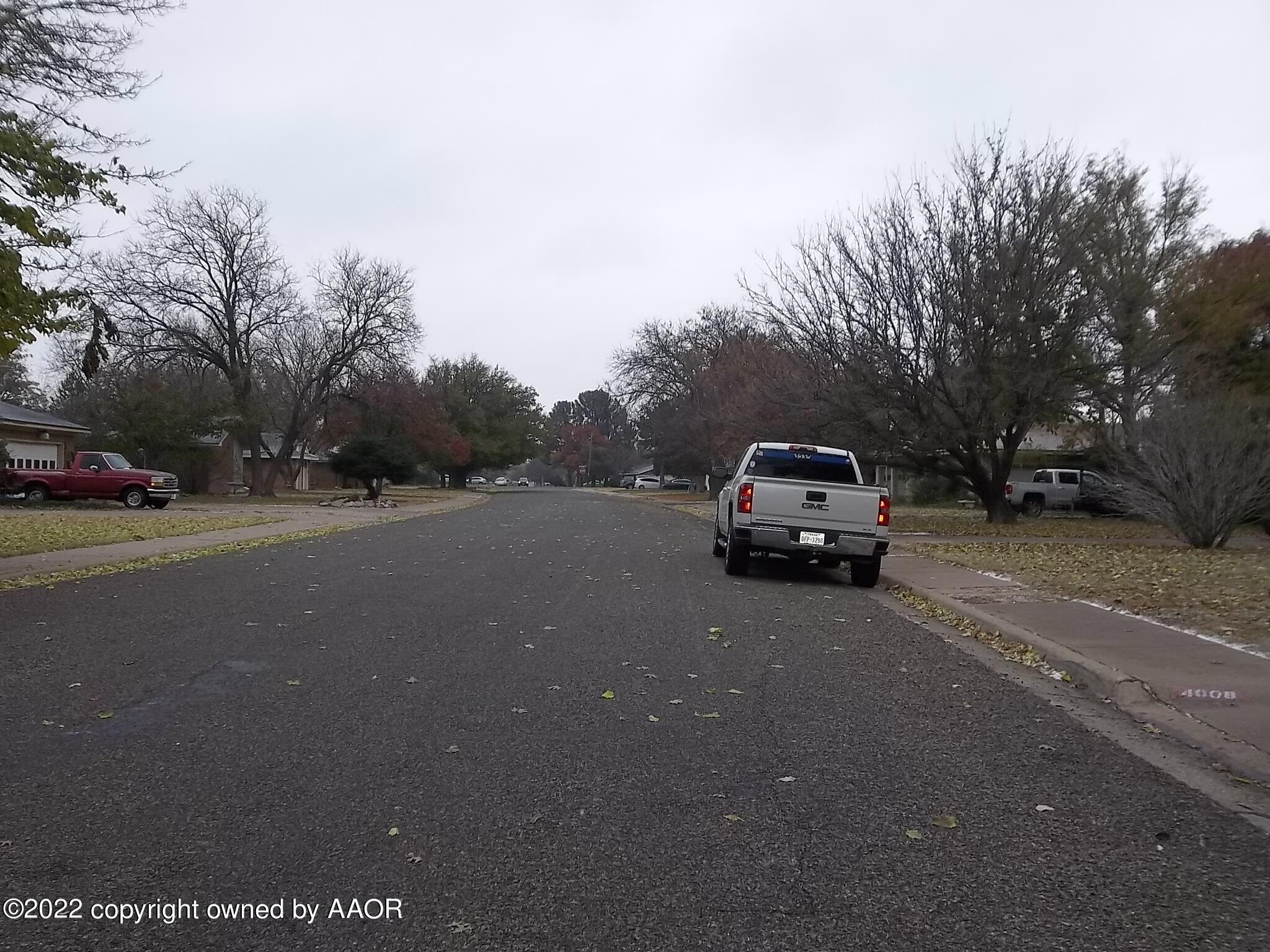 4010 Tucson Drive Amarillo, TX 79109 - Photo 8 of 23 a car parked on the side of a street