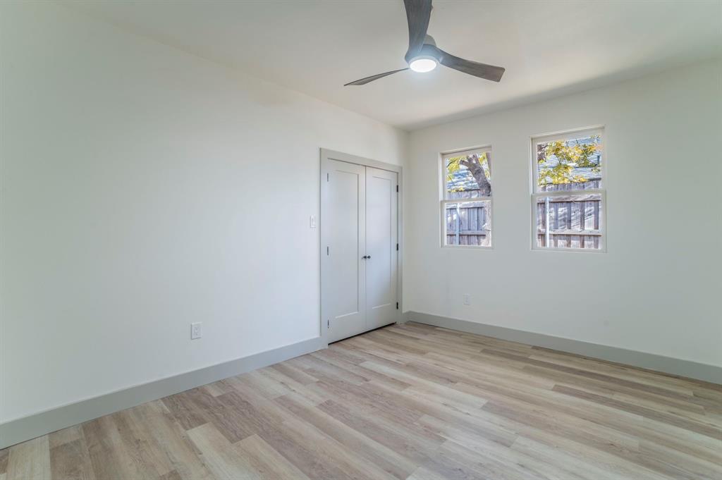 5914 Victor Street Dallas, TX 75214 - Photo 25 of 32 wooden floor in an empty room with a window