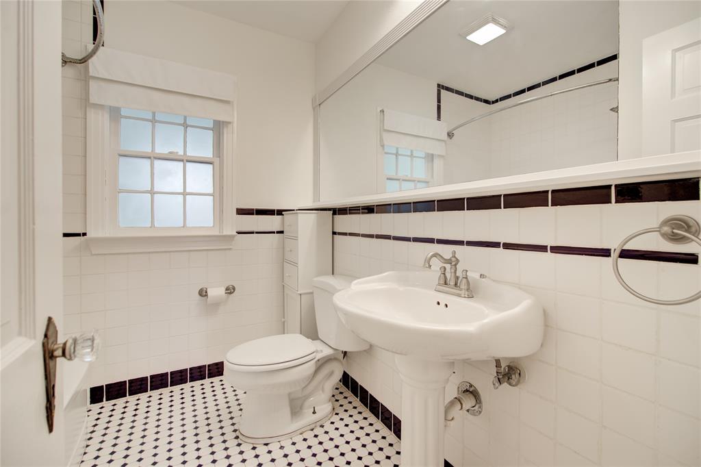 5419 Longview Street Dallas, TX 75206 - Photo 24 of 32 a bathroom with a sink toilet and shower