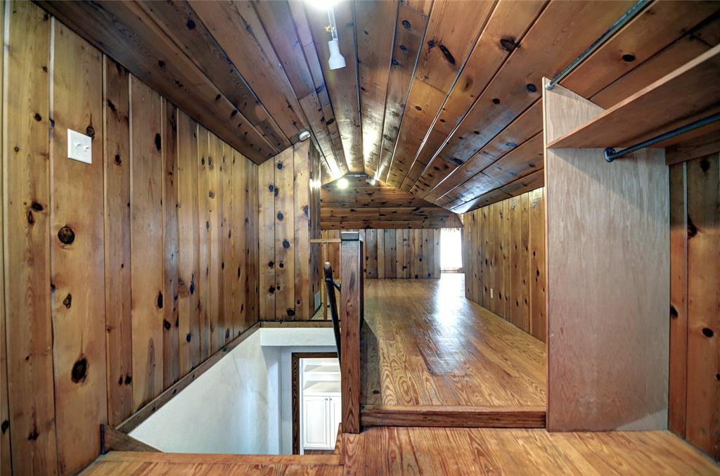 5419 Longview Street Dallas, TX 75206 - Photo 26 of 32 a view of a hallway with wooden floors