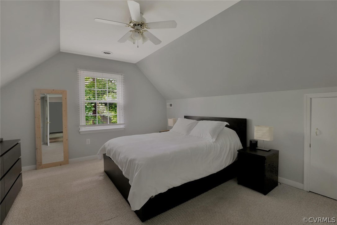 13306 Pointer Ridge Terrace Midlothian, VA 23112 - Photo 15 of 21 a bedroom with a bed and a chandelier